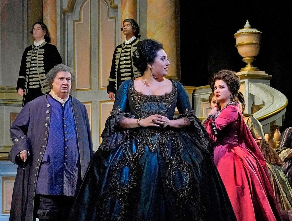 Anita Rachvelishvili as the Princess of Bouillon and Anna Netrebko in the title role of Cilea’s "Adriana Lecouvreur" face off at the Met Opera, while Ambrogio Maestri, as Michonnet, looks on. Photo by Ken Howard.