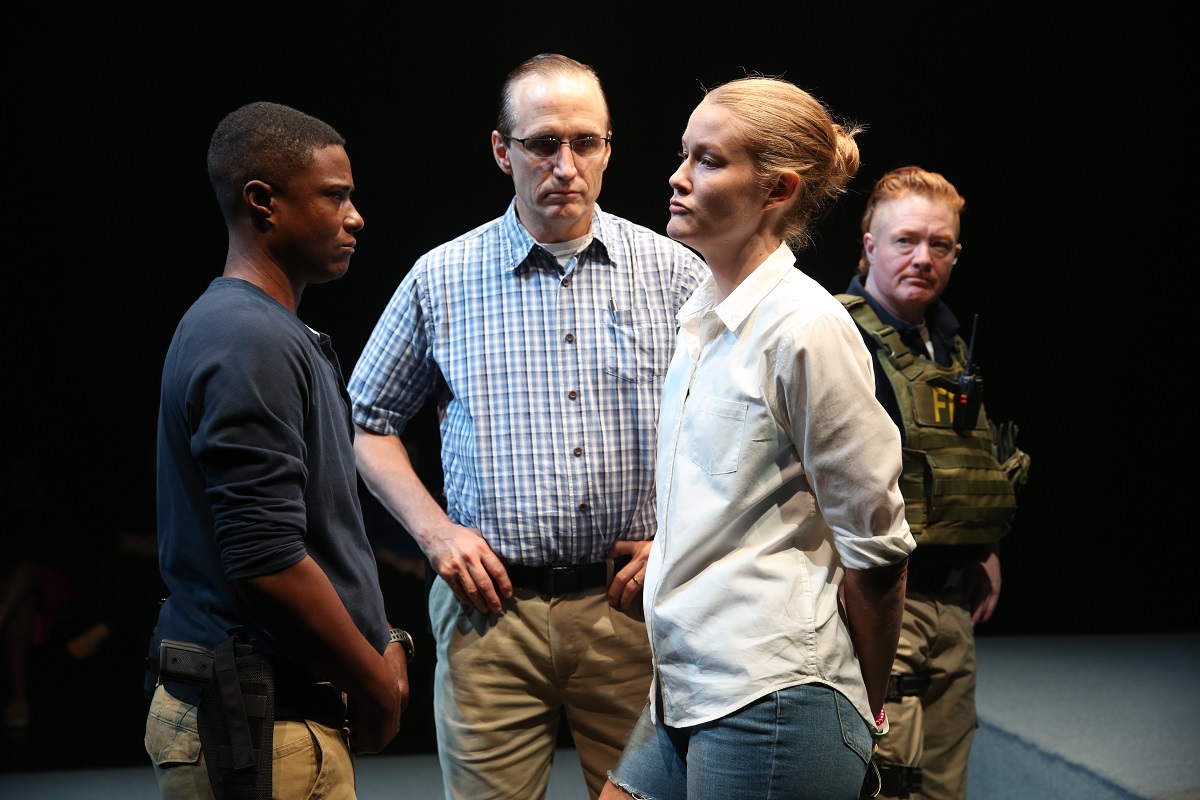 TL Thompson, Pete Simpson, Emily Davis, and Becca Blackwell in Tina Satter's "Is This A Room" at the Vineyard Theatre. Photo by Carol Rosegg.