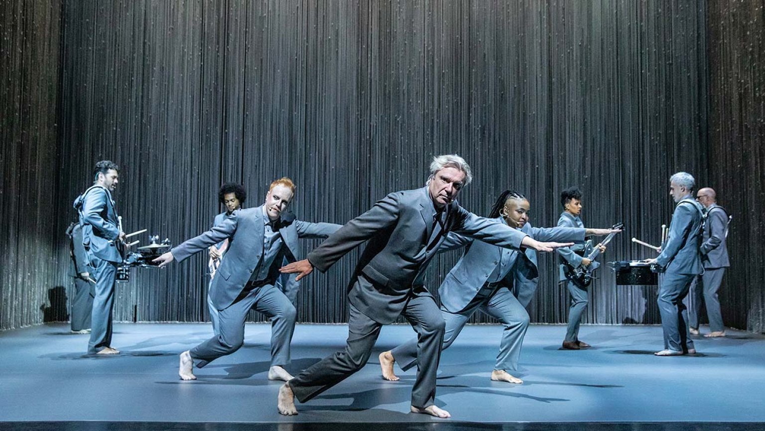 David Byrne leads the company of "American Utopia" at the Hudson Theatre. Photo by Matthew Murphy.