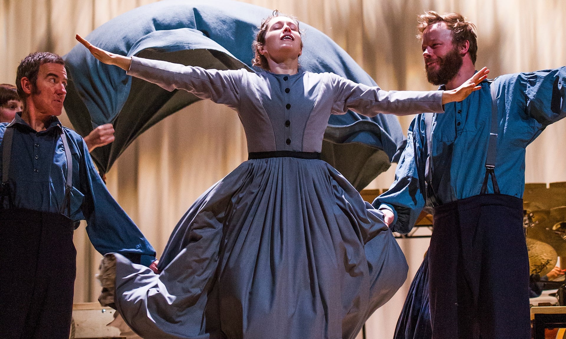 Madeleine Worrall (center) in the title role of the National Theatre's production of "Jane Eyre" streamed via NT at Home. Photo by Tristram Kenton.