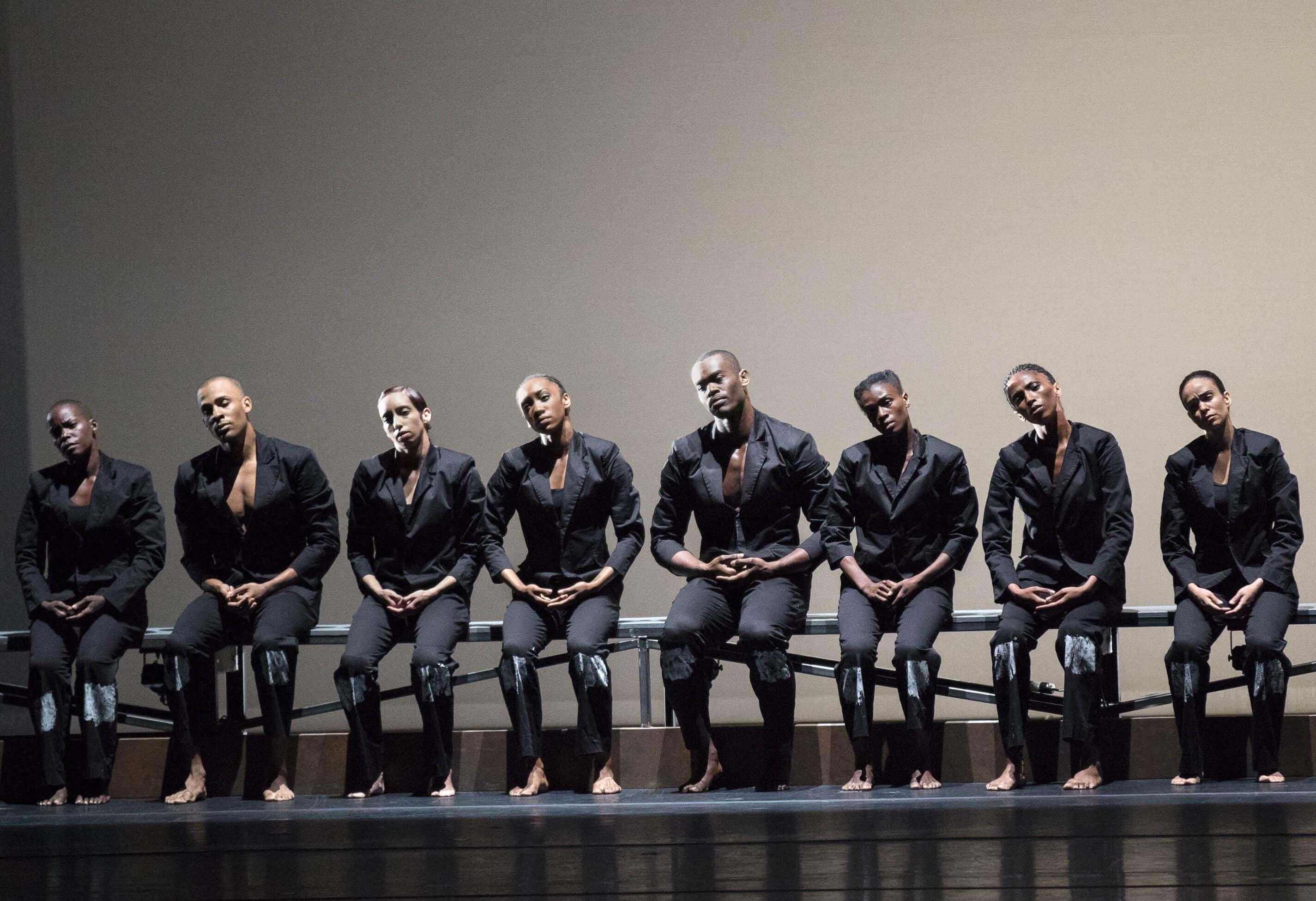 The company of Alvin Ailey American Dance Theater in Robert Battle's "No Longer Silent".